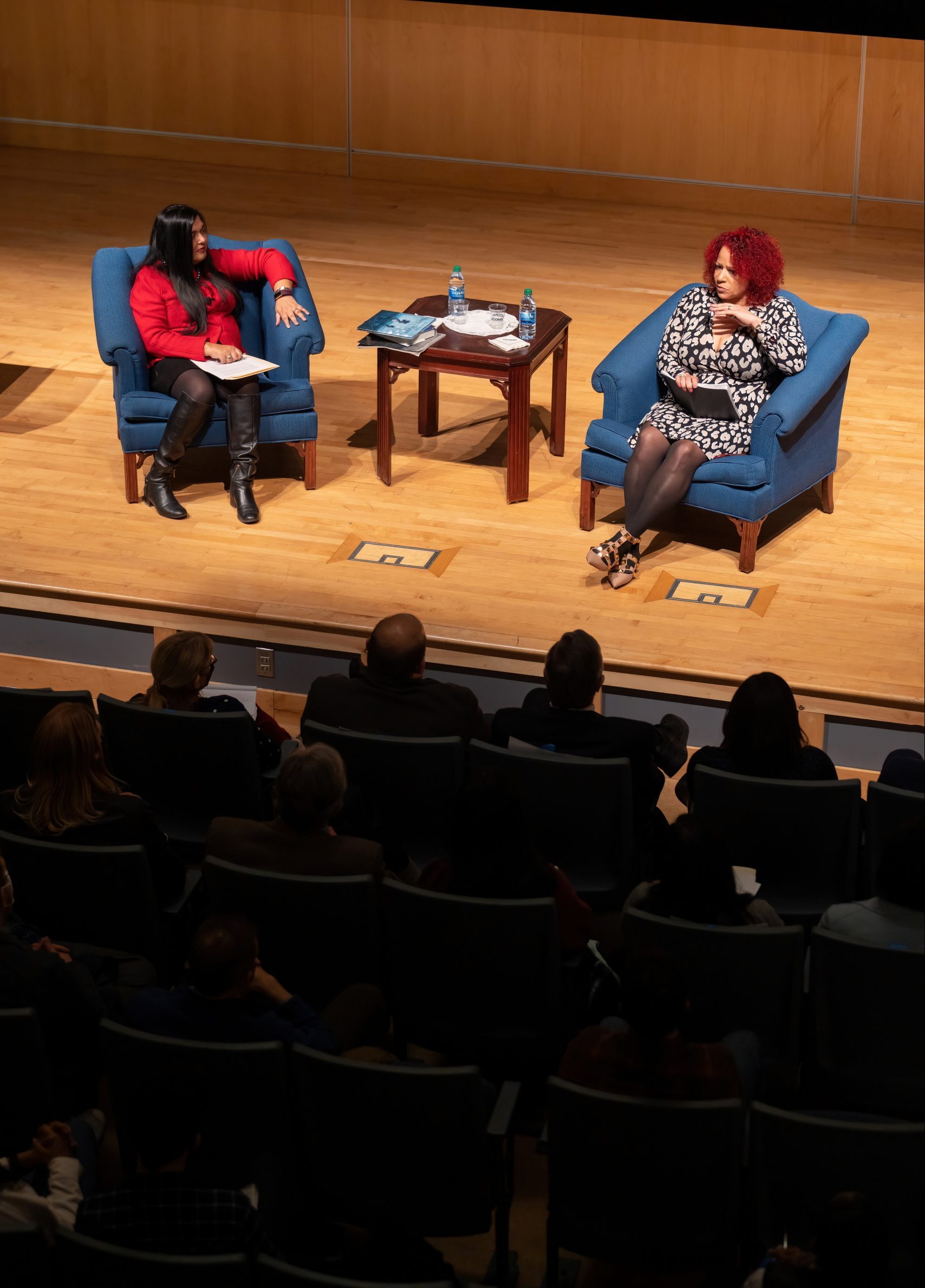 Nikole Hannah-Jones and Manisha SInha sit on stage in front of a large audience.