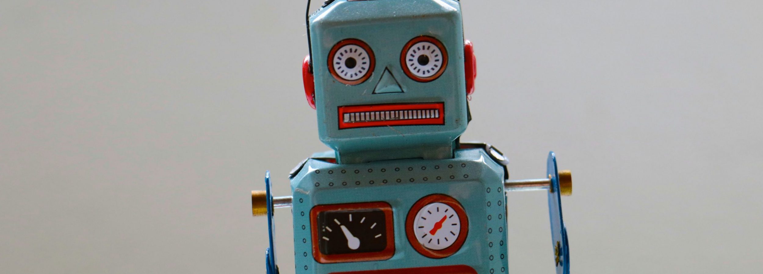 A photograph of a tin robot toy.