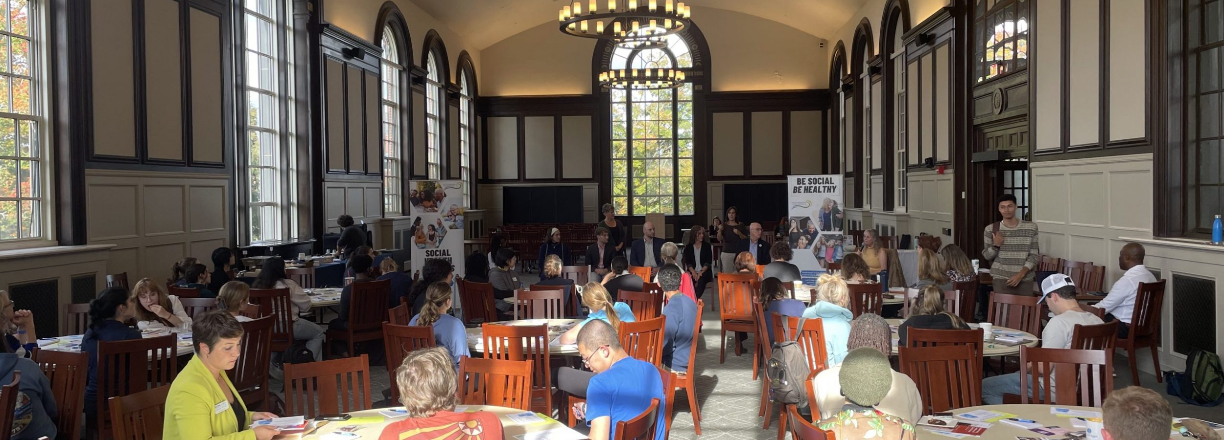 students, faculty, and staff gathered in Wilbur Cross North Reading Room.